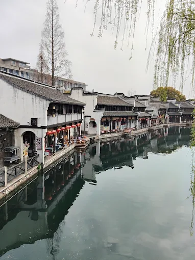 Whitewashed houses along a canal in a Chinese water town